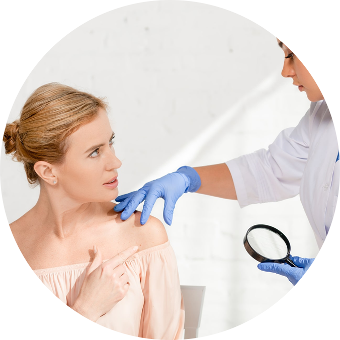 A dermatologist is examining a woman with a magnifying glass